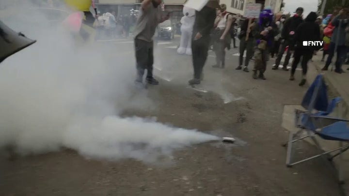 ICE tangles with agitators outside Portland facility