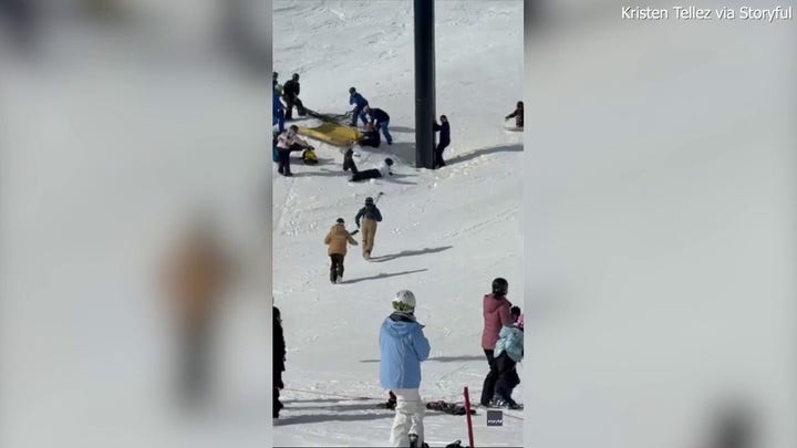 Heart-stopping video shows girl dangling from ski lift before sudden fall
