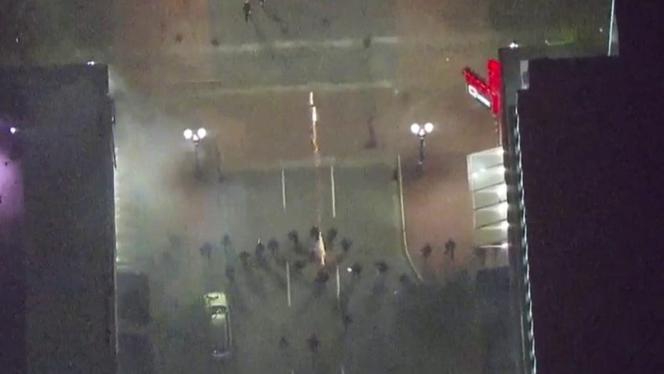 Police shoot tear gas and pepper spray at protesters in Portland, OR