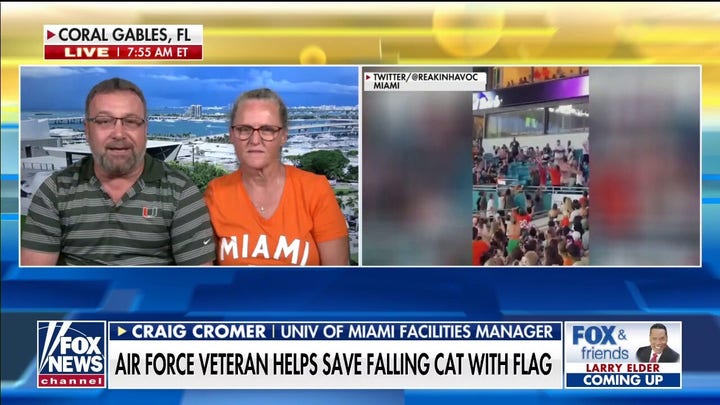 Miami couple who used flag to catch falling cat at football game speaks out