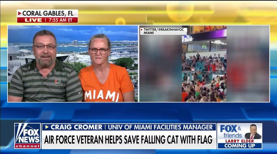 Miami couple who used flag to catch falling cat at football game speaks out