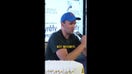 Charlie Kirk is shown describing his favorite Starbucks drink to a young attendee at event