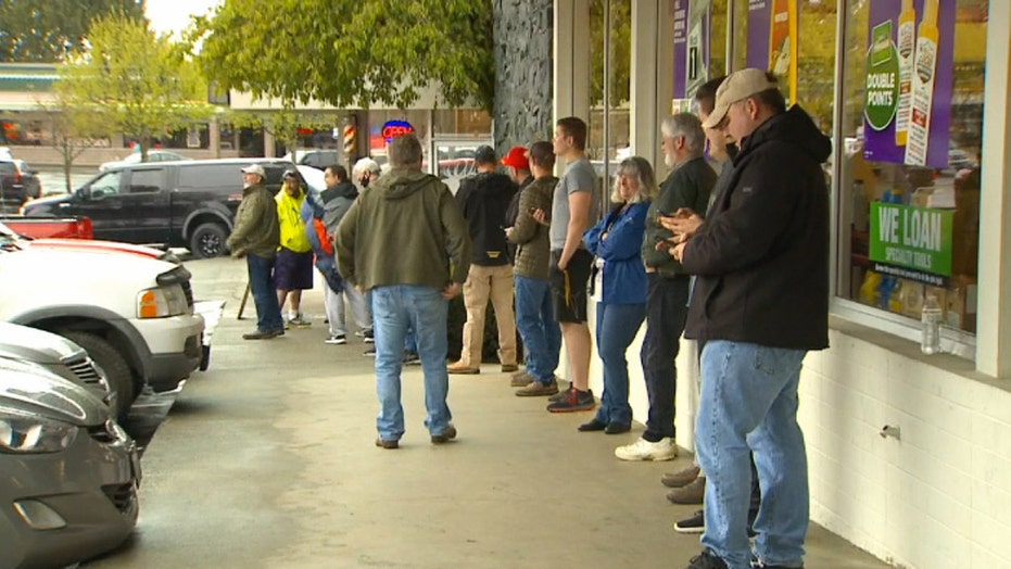 Long line forms outside barbershop in Washington operating outside 'stay-at-home' order