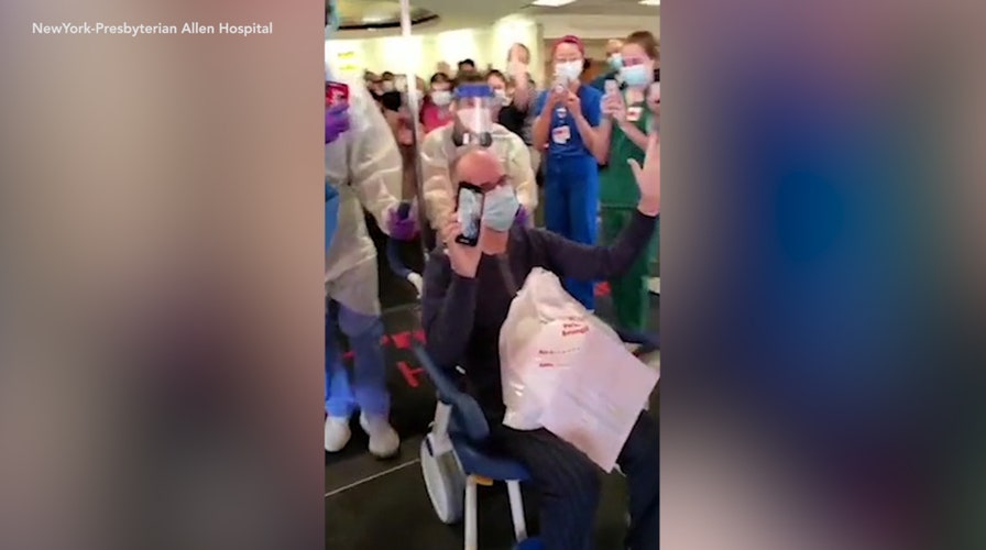 Hospital staff celebrates coronavirus survivor's discharge