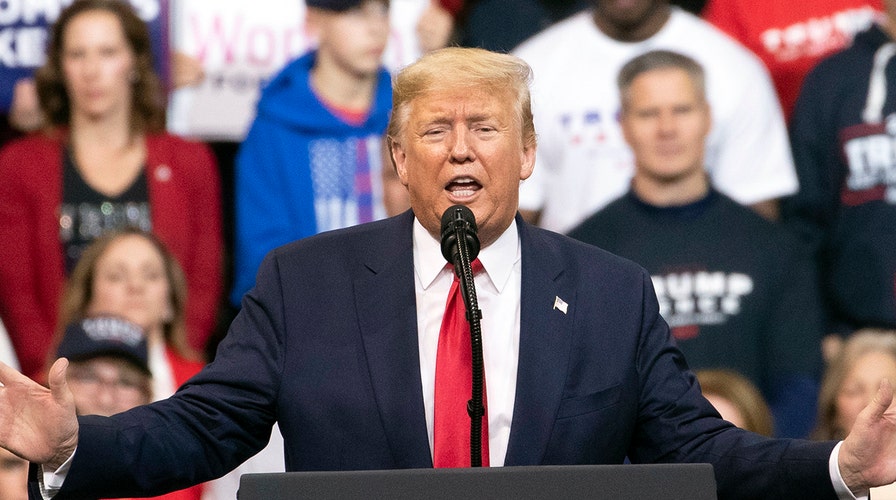 Trump trolls Democrats with rally on eve of New Hampshire primary