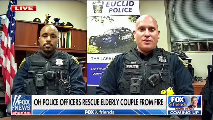 Ohio police officers save elderly couple from Christmas Eve house fire