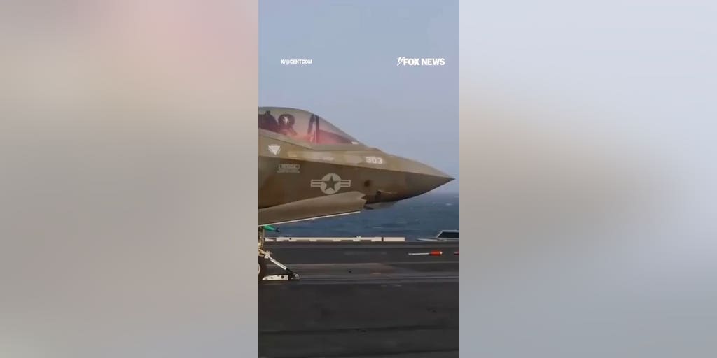 US fighter jet ROARS off USS Abraham Lincoln as it supports Iran blockade