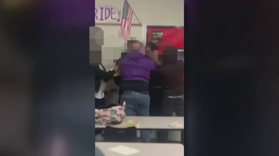 Texas teacher caught on camera slamming student against wall