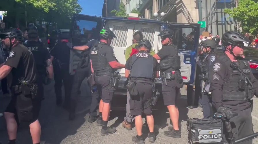 Multiple people arrested after protesters scuffle with Seattle police