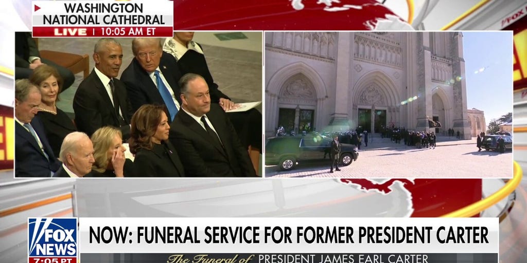 Former President Jimmy Carter's casket bring brought into the cathedral