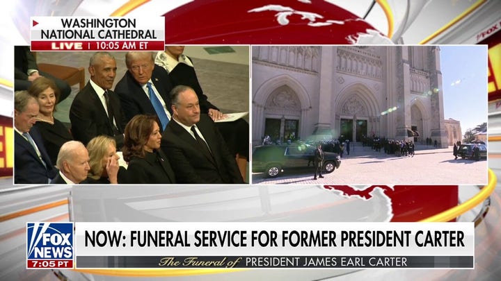 Former President Jimmy Carter's casket bring brought into the cathedral 