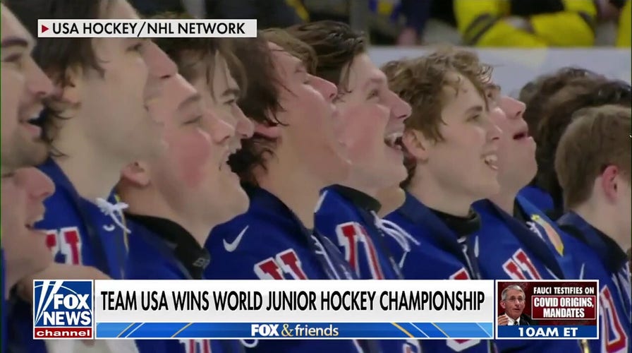 Team USA proudly sings national anthem after winning world junior hockey championship