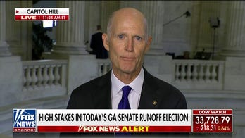 Sen. Rick Scott says Democrats want to distract Georgia voters