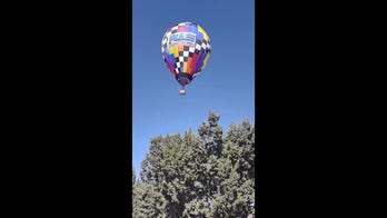  Hot air balloon lands in neighbor’s backyard