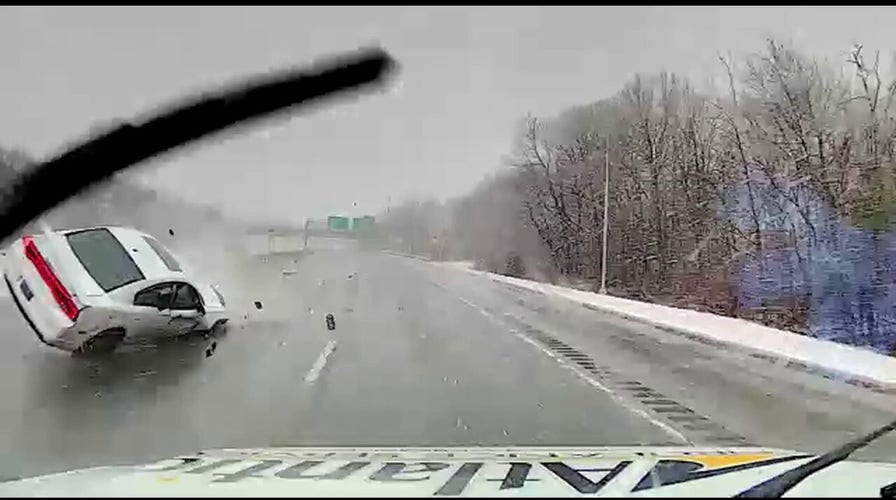 Massachusetts ambulance driver narrowly avoids highway rollover crash