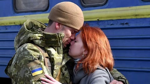 Scene at Polish border brings US delegation to tears as families flee to safety