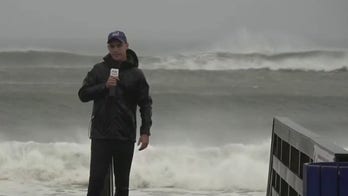 Ten-foot waves on Long Island beaches as tropical storm Henri rolls in