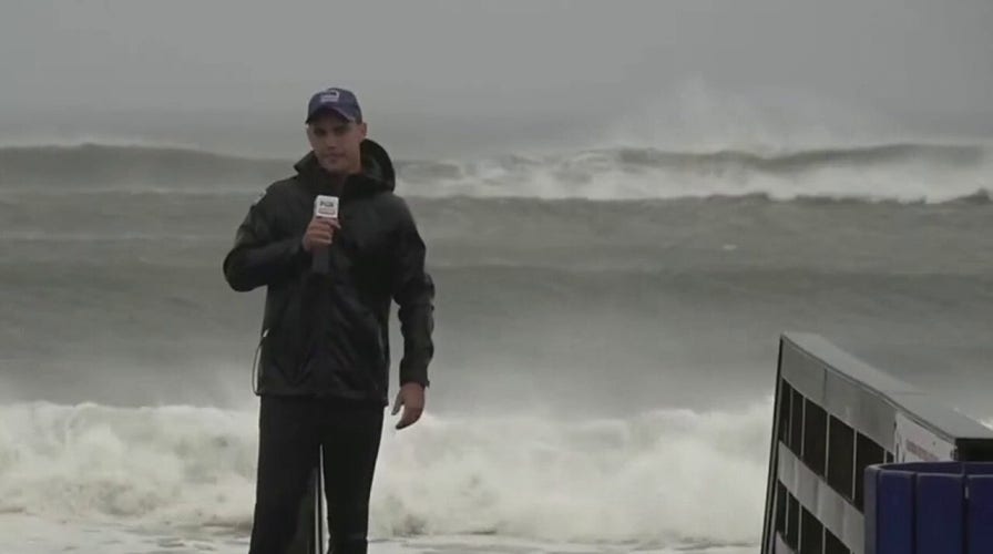 Ten-foot waves on Long Island beaches as tropical storm Henri rolls in
