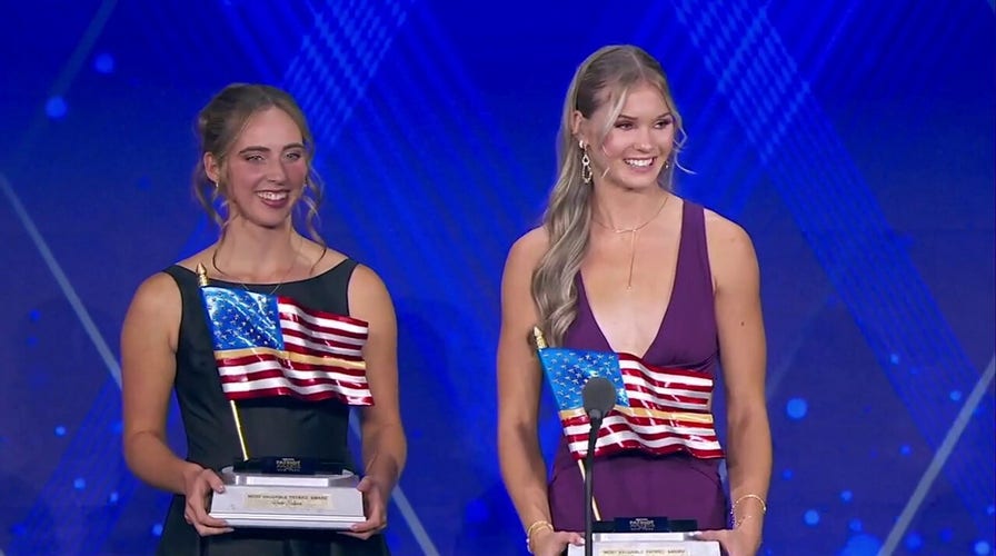 Alexa Anderson and Reese Eckard accept the 'Most Valuable Patriot Award' at Fox Nation Patriot Awards