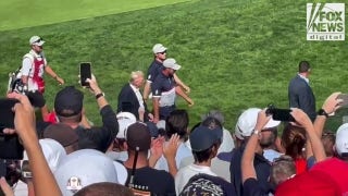 Trump walks to first tee at Ryder Cup with Bryson DeChambeau