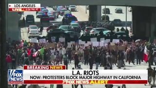 Protesters block major highway in California