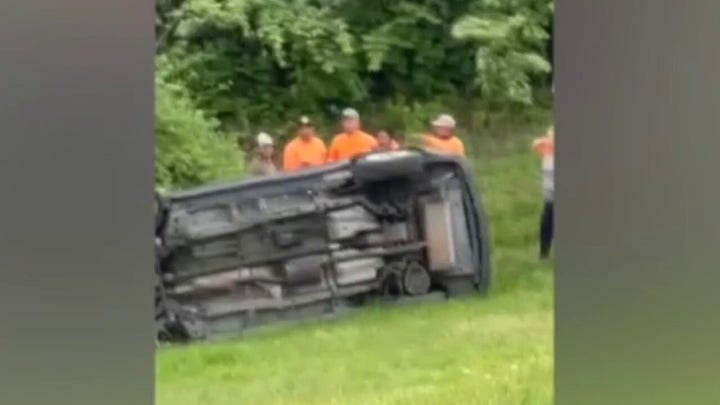 Good Samaritans help rescue woman trapped inside flipped car