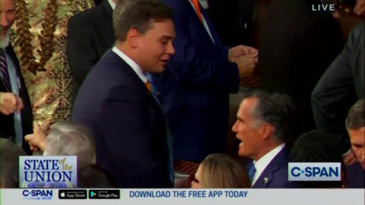 George Santos and Mitt Romney exchange words ahead of President Biden's State of the Union address