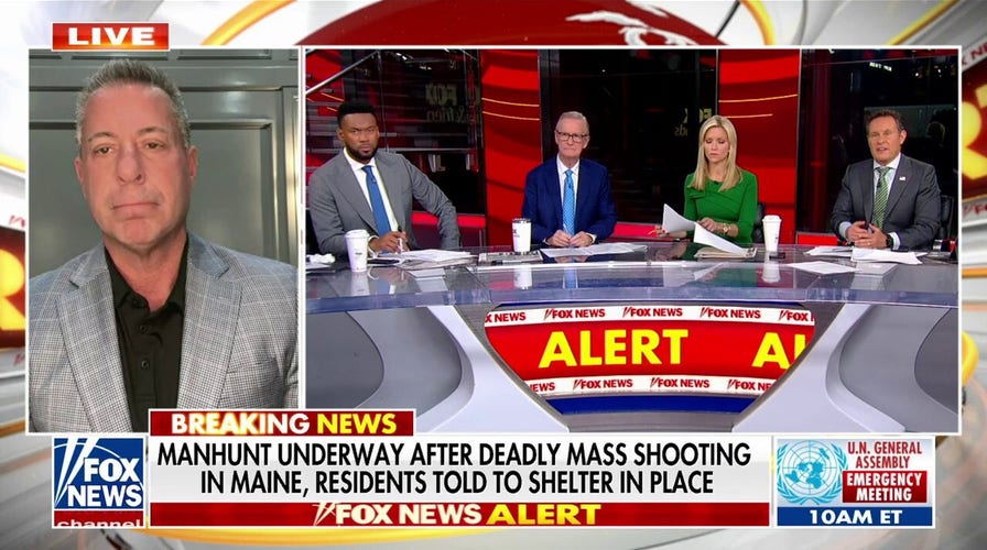 Maine residents shelter in place as police hunt for person of interest in mass shooting