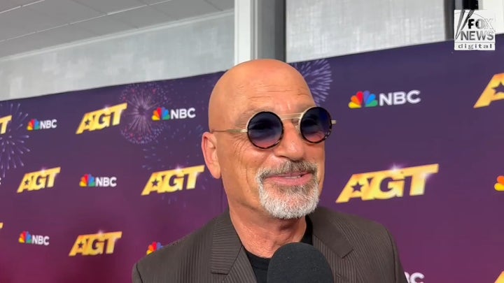 Heidi Klum Jumps into Howie Mandel's Lap During Shocking 'AGT' Performance