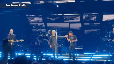 Jon Bon Jovi lets Train frontman Pat Monahan take over during Madison Square Garden concert