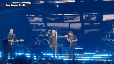 Jon Bon Jovi lets Train frontman Pat Monahan take over during Madison Square Garden concert