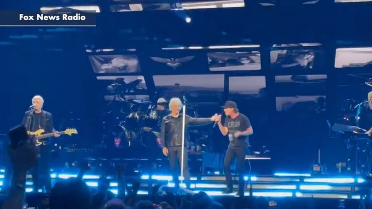 Jon Bon Jovi lets Train frontman Pat Monahan take over during Madison Square Garden concert