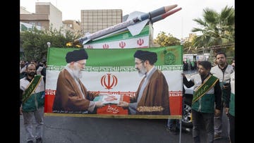 Iran economy ‘on the verge of collapse’ as tensions with US escalate