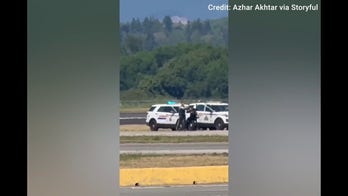 Stolen plane forces Vancouver airport to ground all flights in dramatic security standoff