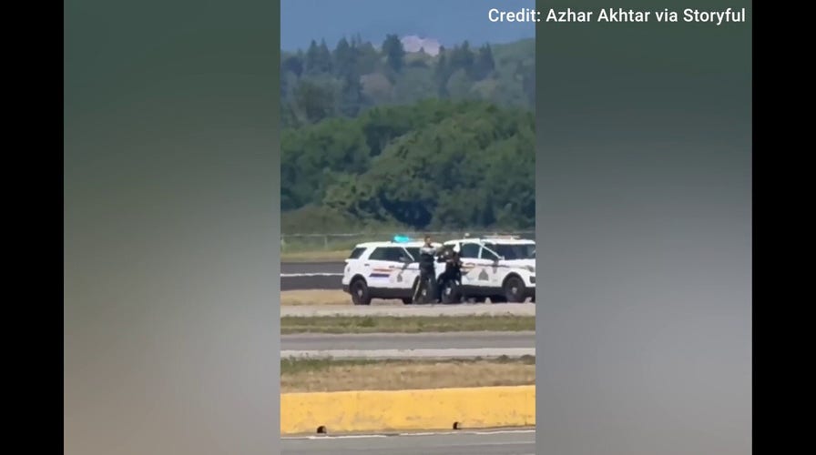 Stolen plane forces Vancouver airport to ground all flights in dramatic security standoff