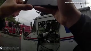 Deputy and bystander help rescue mail truck driver from fiery crash