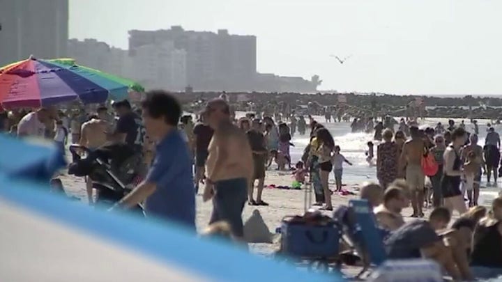 Some spring breakers ignoring coronavirus warnings by flocking to crowded beaches, concerts