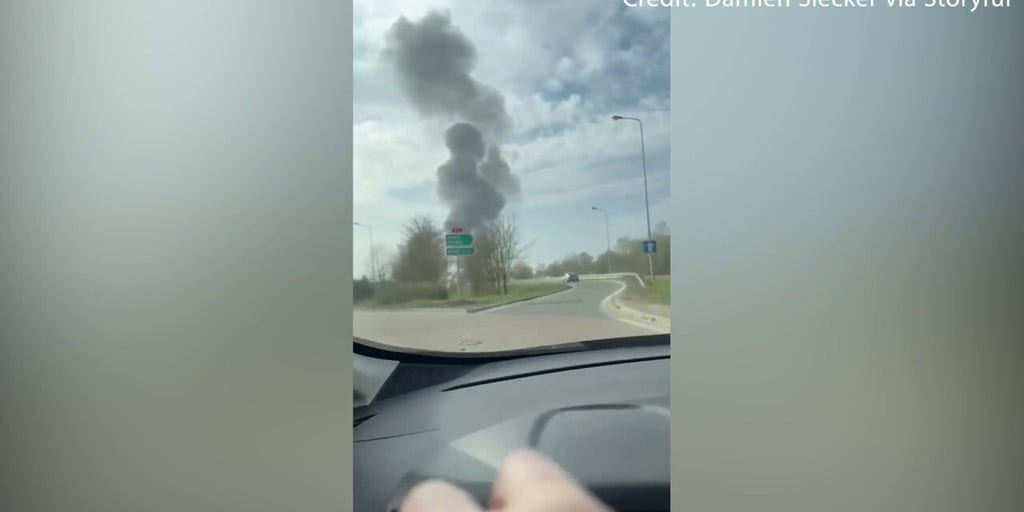 Two military jets collide in midair stunt, dramatically crash to ground in fiery explosion