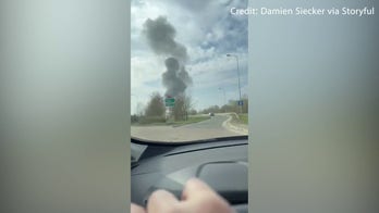 Two military jets collide in midair stunt, dramatically crash to ground in fiery explosion