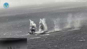 China conducts live-fire drills with rockets near Taiwan as military issues warning