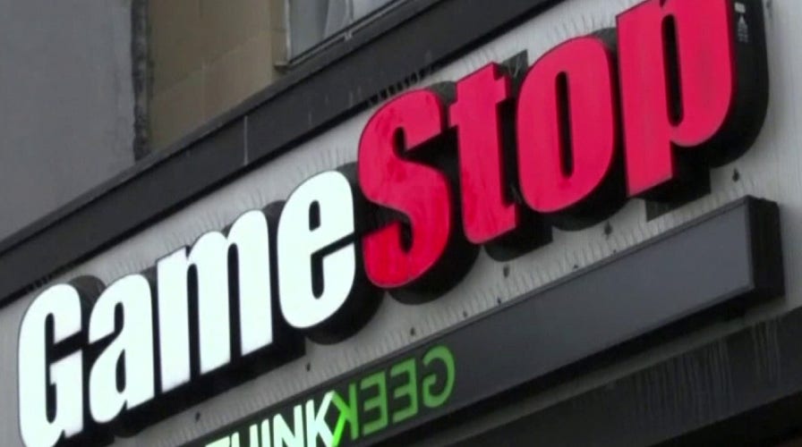 Retail investors drive up GameStop share price as Wall Street loses billions