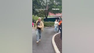 Journalists RUN FOR COVER after shots fired near White House