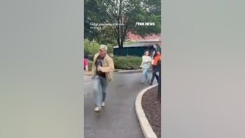 Journalists RUN FOR COVER after shots fired near White House