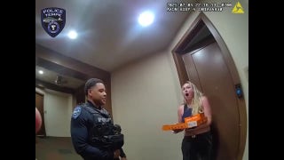 Viral video shows shocked customer's reaction when officers deliver her pizza
