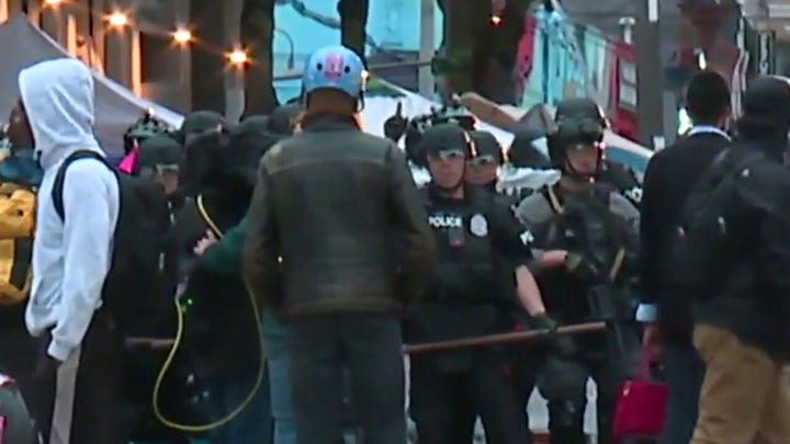 Seattle police clearing out 'CHOP' zone after mayor declares unlawful assembly