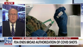 FDA approves new COVID shot for higher risk groups