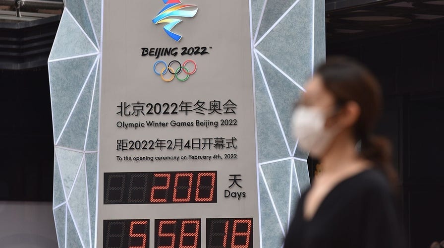Beijing Winter Olympics stirs controversy, with lockdown and boycotts