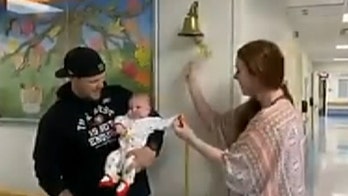 Infant diagnosed with inoperable brain tumor rings chemo bell, now cancer-free