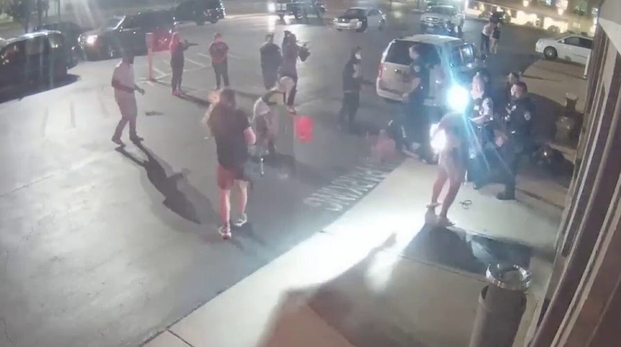 New video shows suspect charging Ferguson officer who is now fighting for his life.