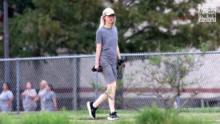 Elizabeth Holmes exercises at Federal Prison Camp Bryan in Texas